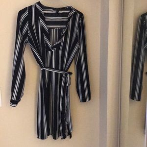 Black & white striped dress (just above the knee)